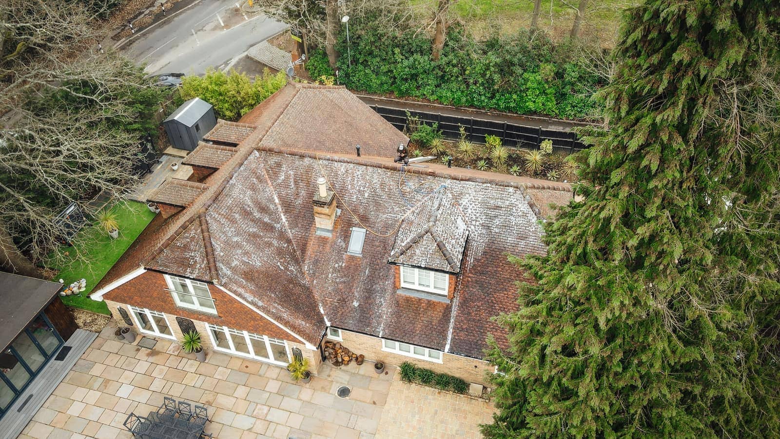 Roof cleaning with Algo Clear Pro solution